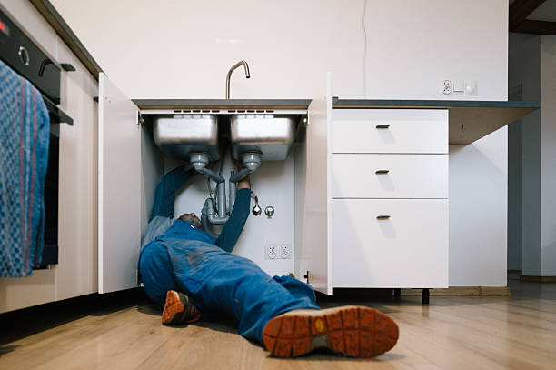 Professional Emergency Plumber technician working in Ligonier, IN